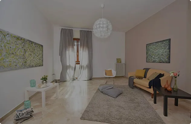 Living room lit by harsh artificial light